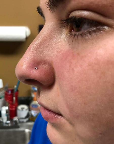 Katie Heisler - Nostril piercing